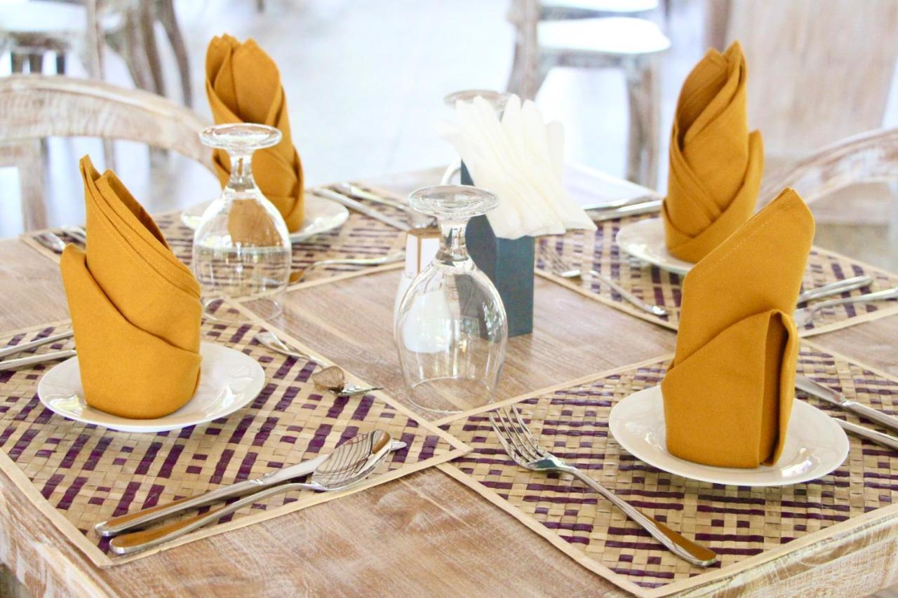 Nivadoo Resort Sigiriya Exteriör bild A table set for fine dining