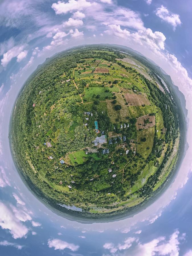Nivadoo Resort Sigiriya Exteriör bild Aerial view of the village